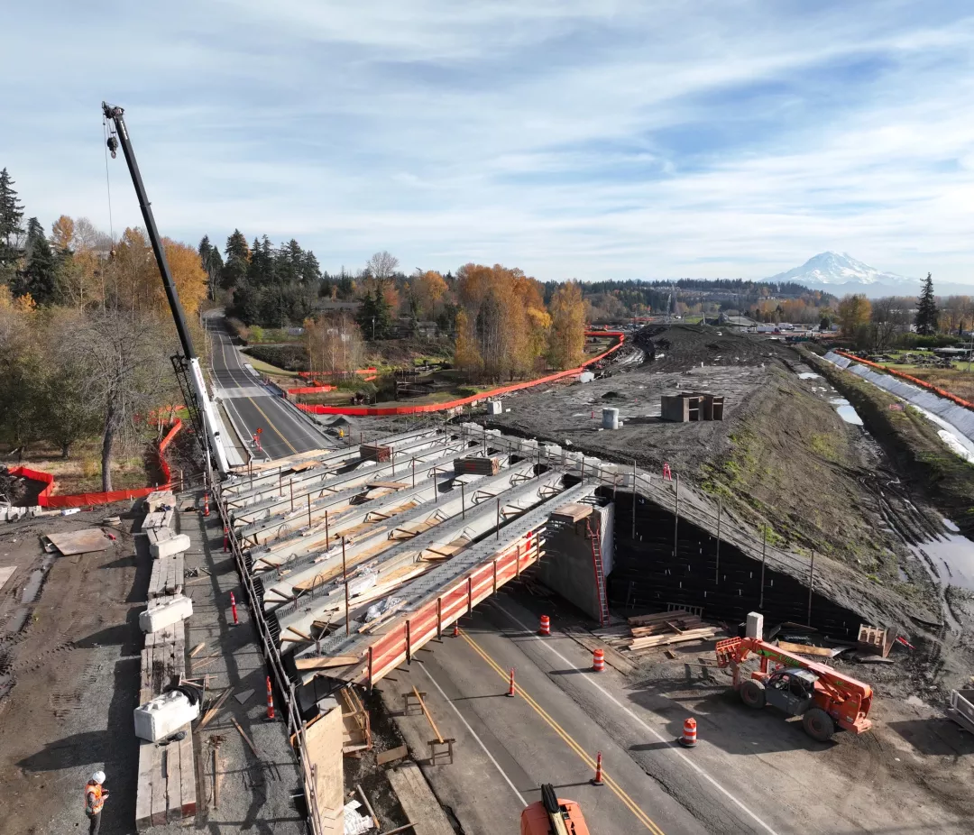 Bridge under construction with Mount Rainier in the background